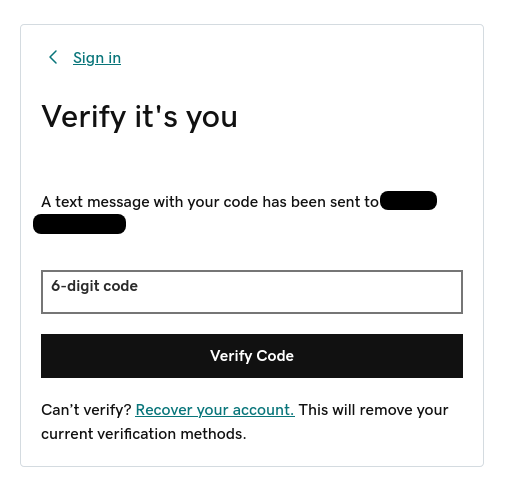 GoDaddy identity verification page using unique 6-digit code sent via text message